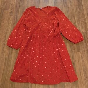 Wraparound red dress with flowers, 100% cotton.